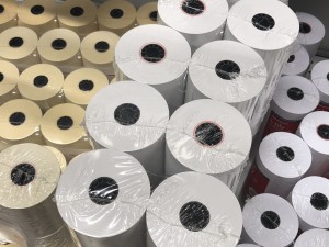 Shrink film wrapped paper rolls