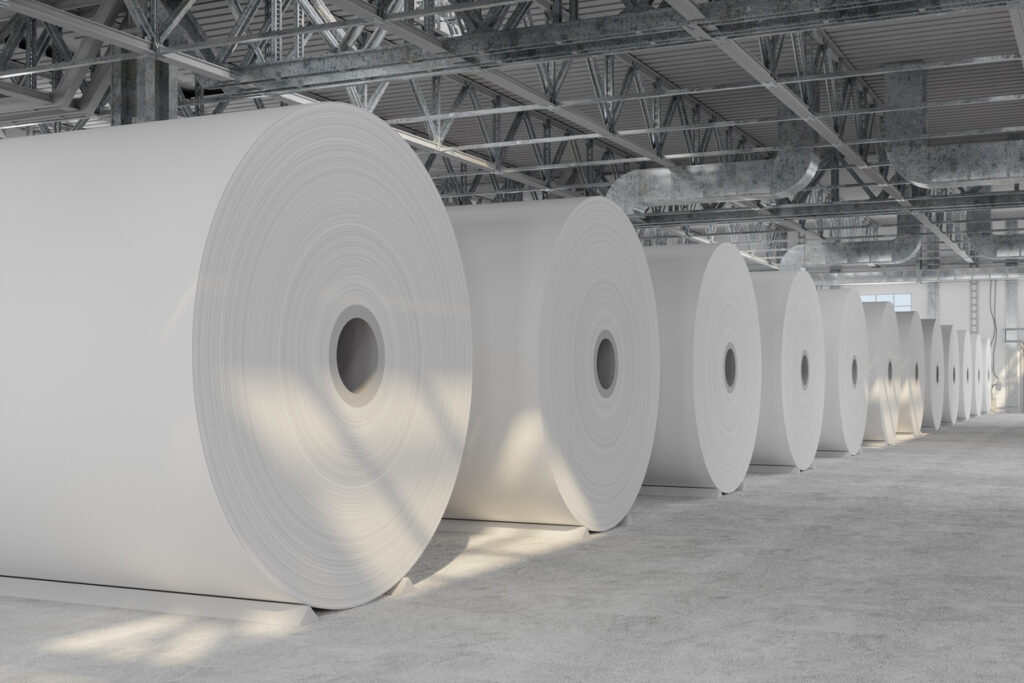 Close-up View Of industrial Paper Rolls In Warehouse